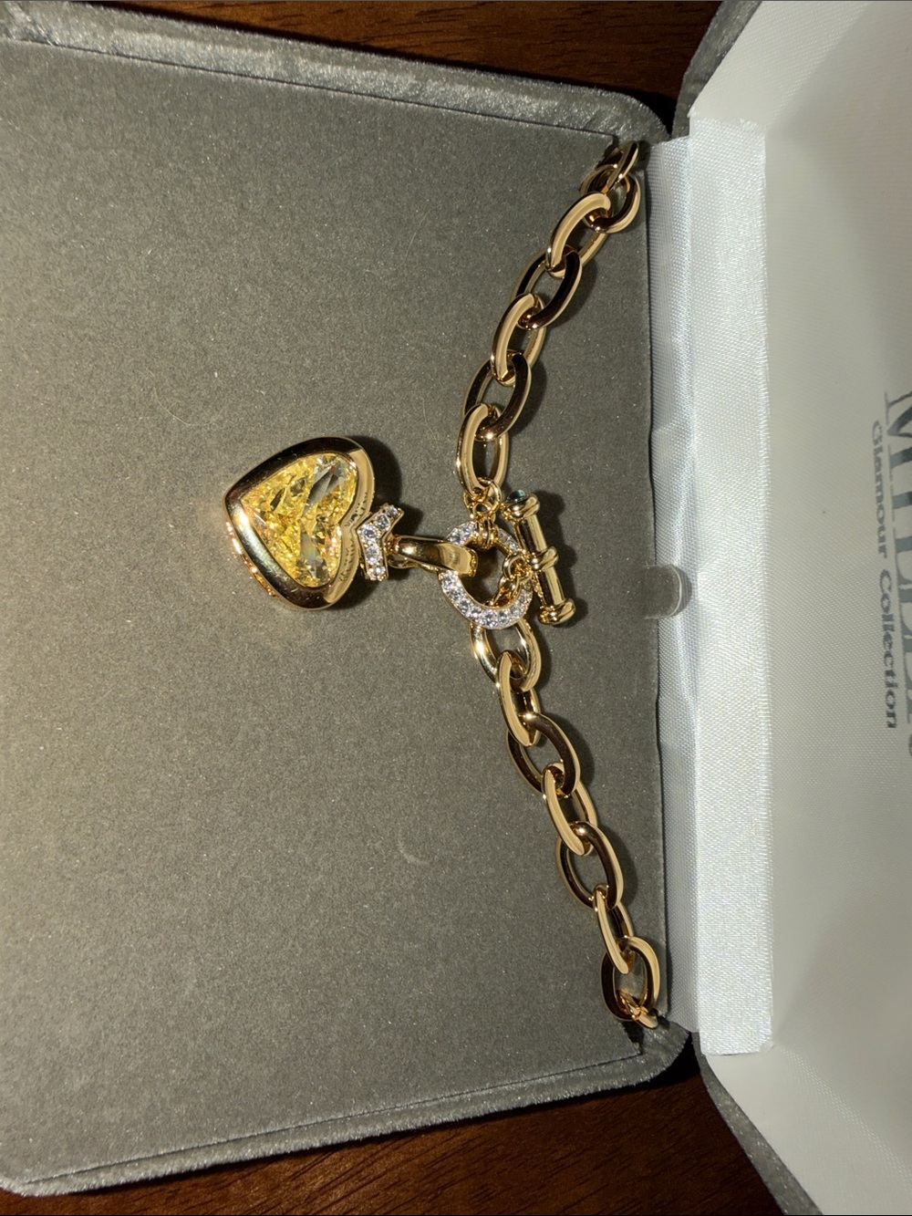 Nolan Miller Gold Heart Locket Necklace with Clear Crystal Accents - Picture 2 of 4